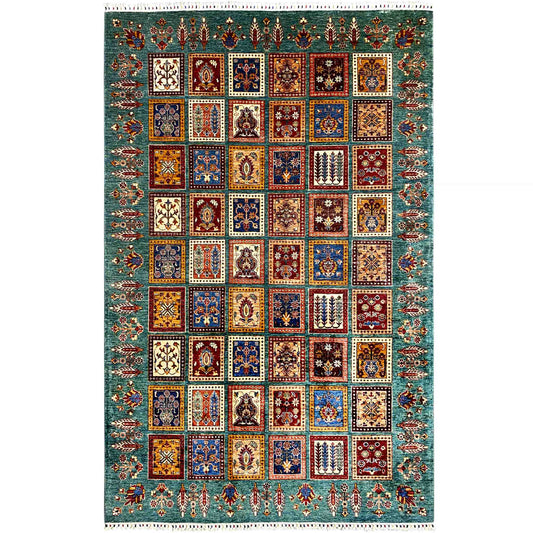 Ziegler rug: multicolored tile pattern on a petrol-blue background, with fringes