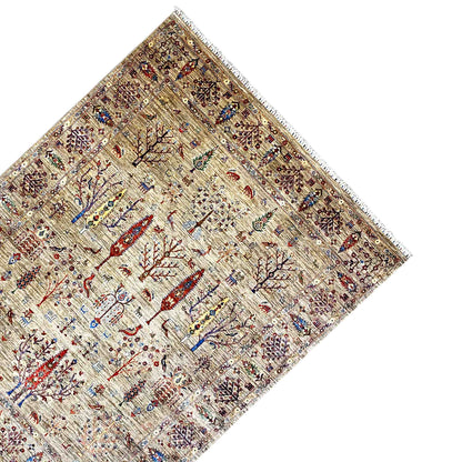Ziegler carpet at an angle from above, beige with numerous figurative and floral ornaments