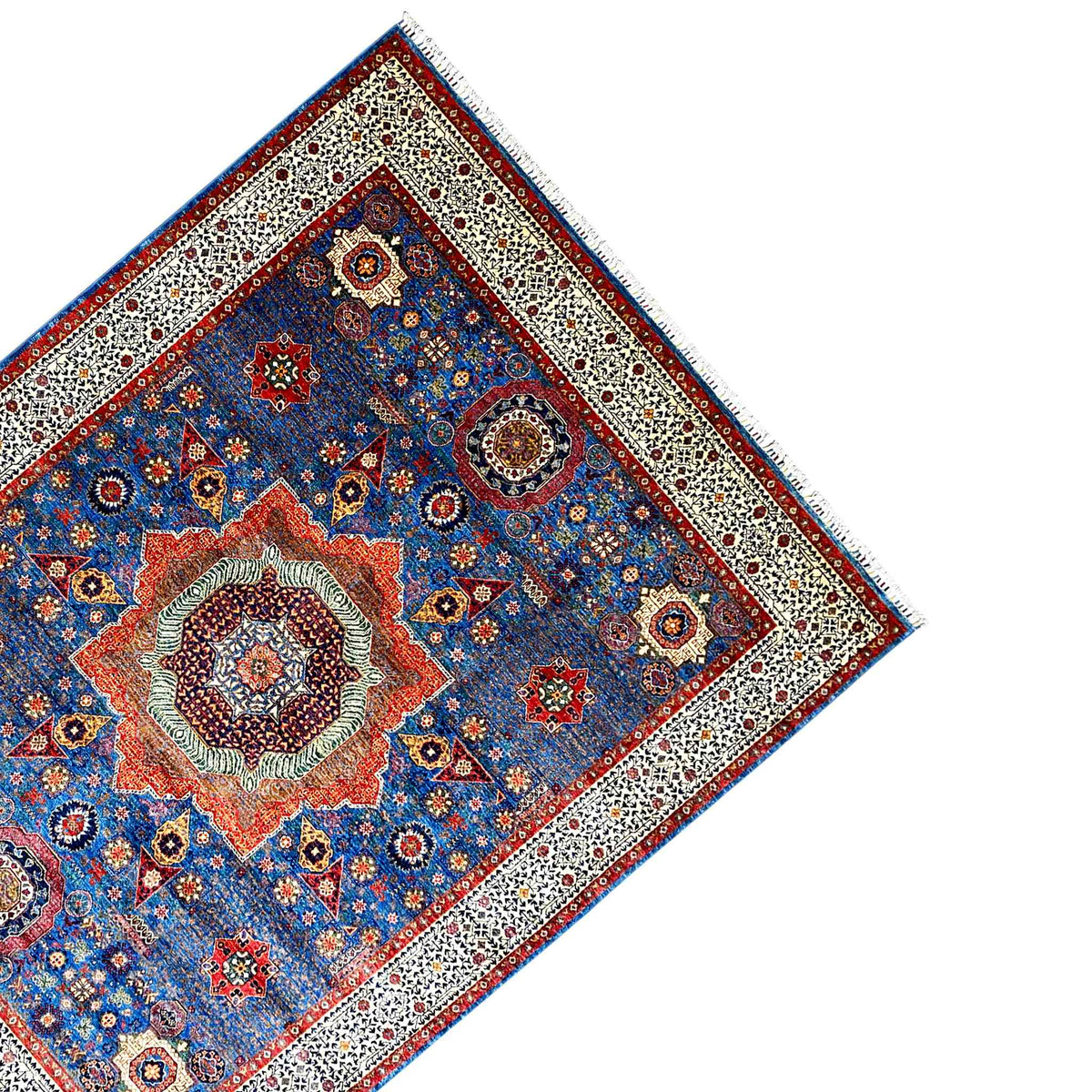 Ziegler carpet corner: blue medallion ornament, beige border, and red side line