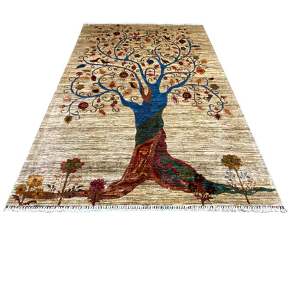 Rug with a large tree motif in blue and red on a beige background, fringes