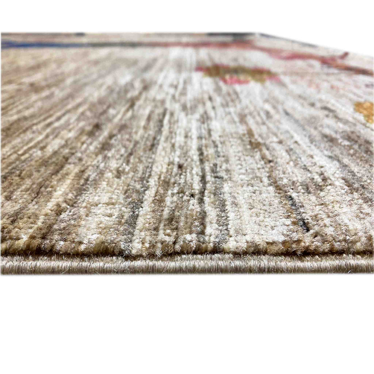 Rug front with beige pile and fine textured lines, edge with fringes