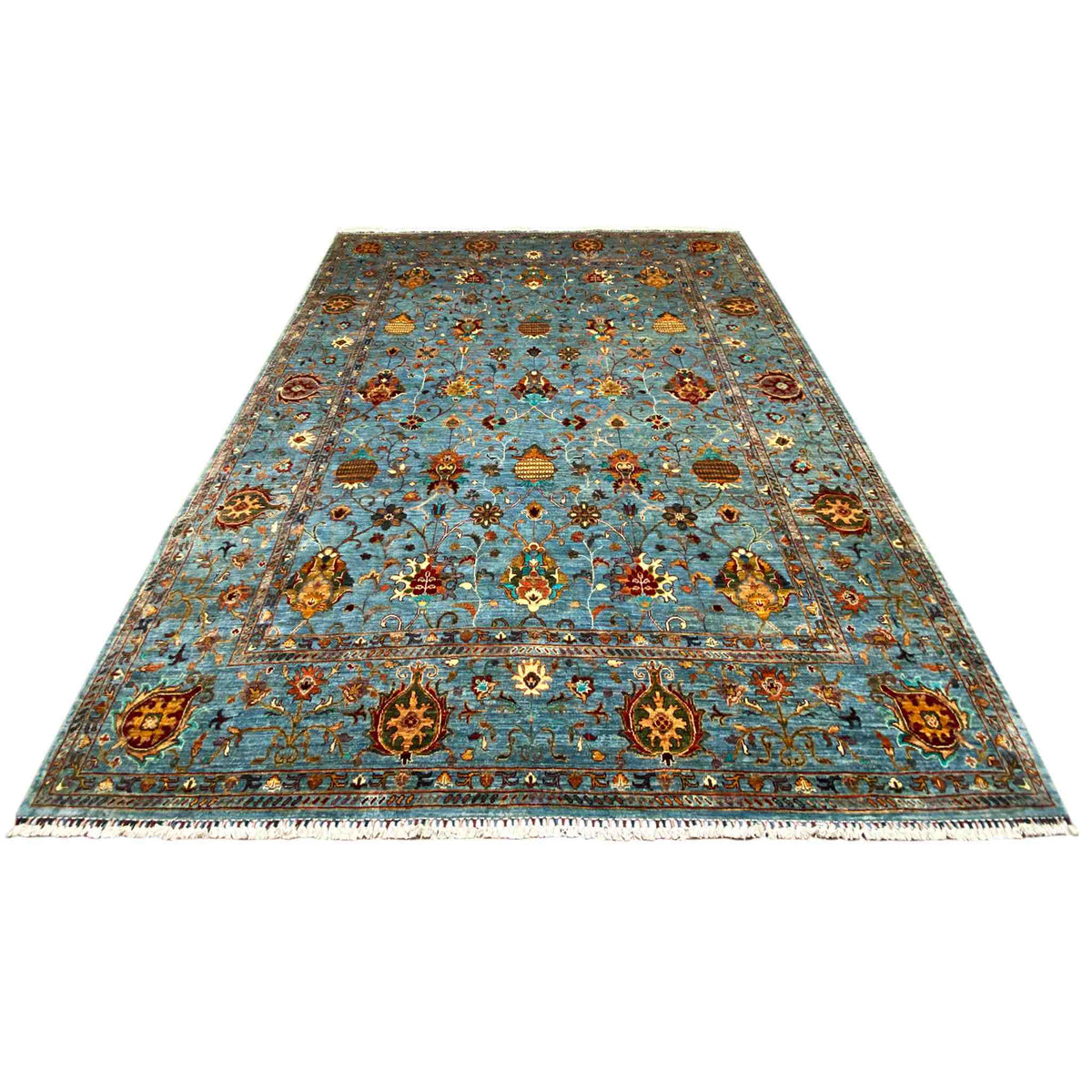 Blue oriental rug with a tile pattern, floral motifs, and a wide border