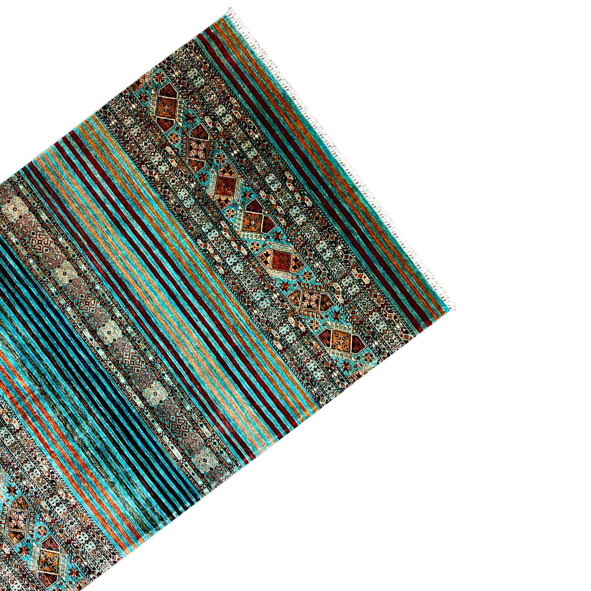 Carpet corner in angled view: striped pattern, ornamental panels, fringes along the edge