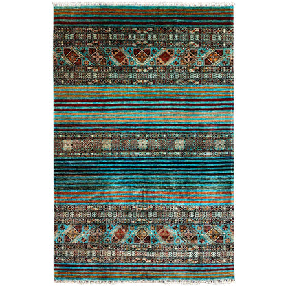 Rug with a multicolored striped and patterned design, fringes along the top edge