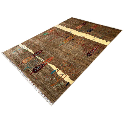 Rug photographed at an angle on a brown background, with beige stripes and multicolored motifs