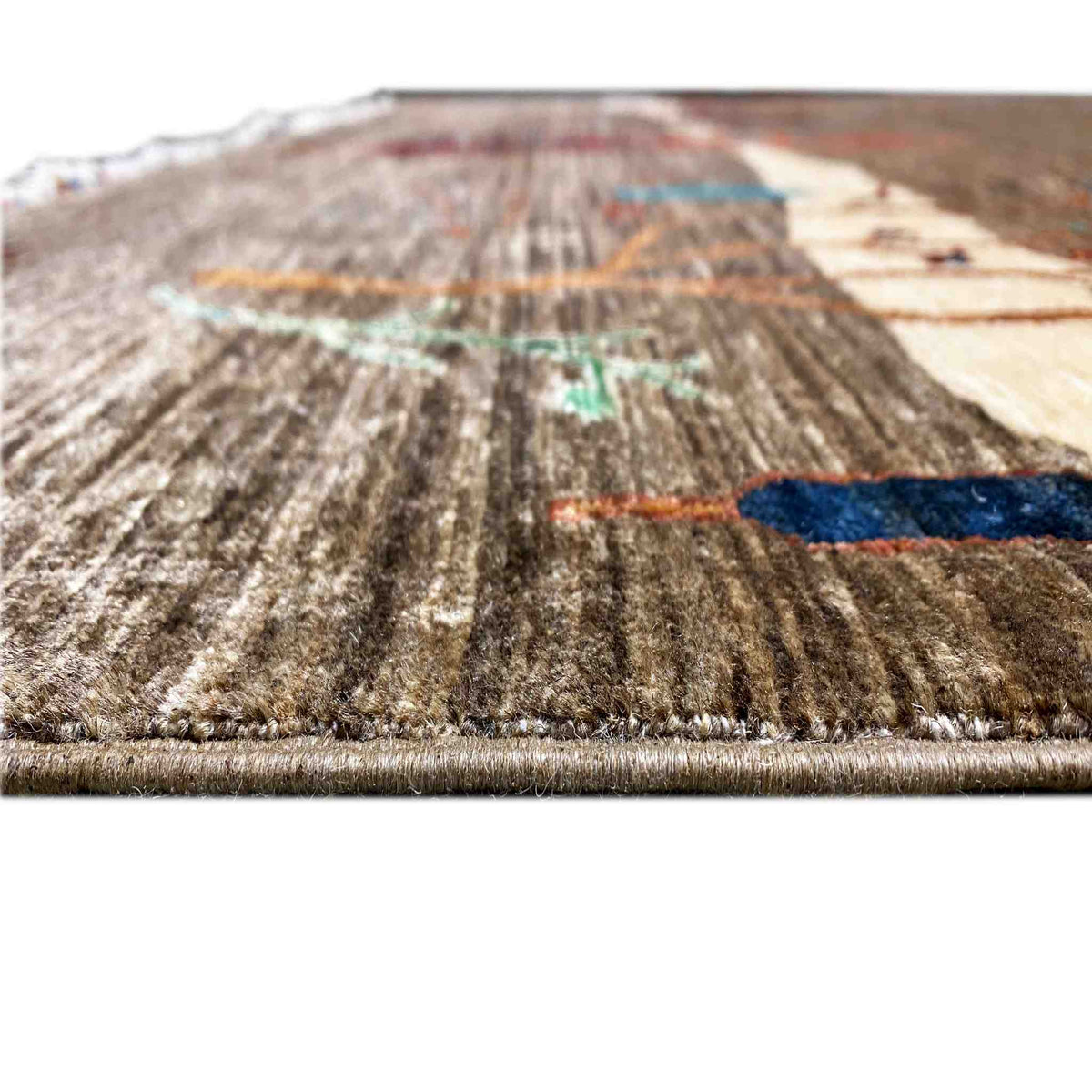 Close-up of carpet: brown pile texture with beige areas and a blue decorative line