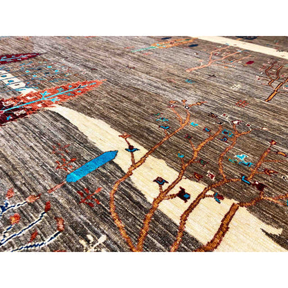 Close-up of a carpet pattern with colorful lines, ornamental areas, and a brown background
