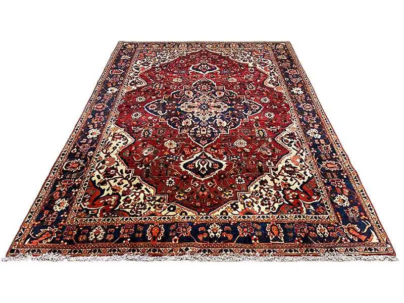 Bakhtiari rug (306x207 cm) lying flat: red central medallion, multicolored border