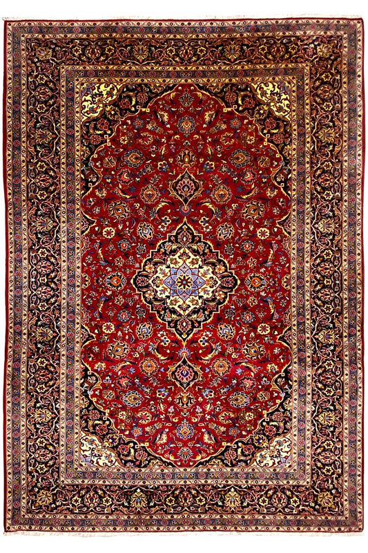 Keshan rug front view: red ornamental pattern with a closed frame border