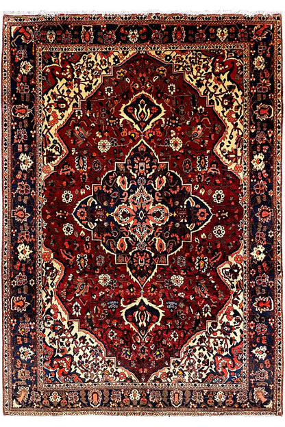 Bakhtiari rug, rectangular, red with medallion pattern and decorative border, 306×207 cm