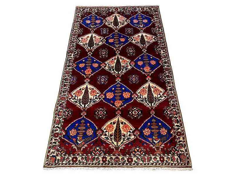 Rectangular Bakhtiari rug, burgundy with blue and cream-colored diamonds and a border.