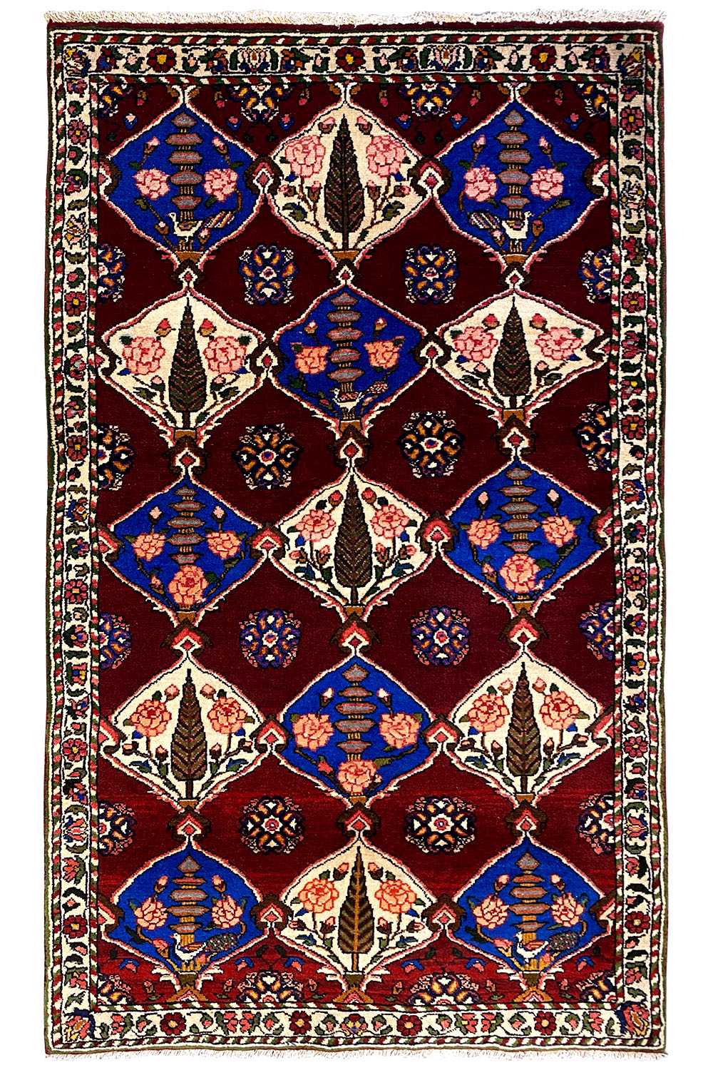 Bakhtiari rug (186x102 cm) with a geometric diamond pattern, burgundy background, and border.