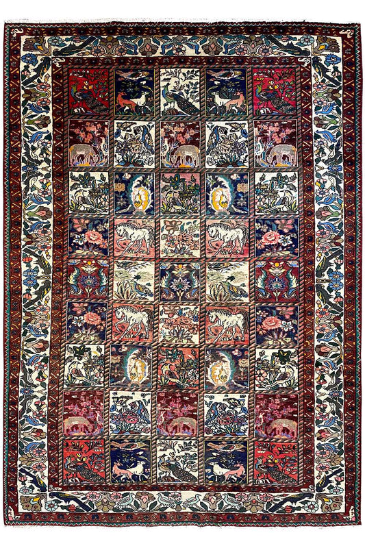 Large Oriental rug with patchwork squares, surrounding frame, and ornamental border