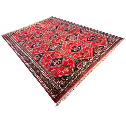Baluch rug, red and dark blue pattern with a surrounding border and white fringes
