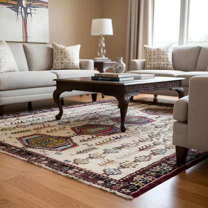 Baluch rug 176x99 cm with a cream-colored field and colorful ornaments in the living area
