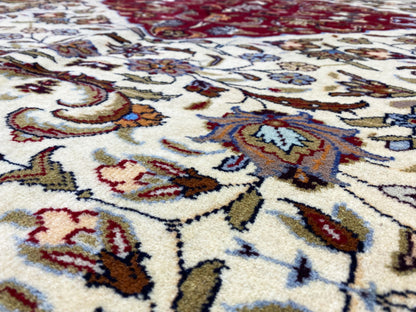 Baluch rug detail, motifs in cream, red and blue