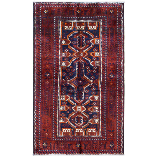 Rectangular Baluchi rug, red with a blue geometric pattern and a surrounding border.