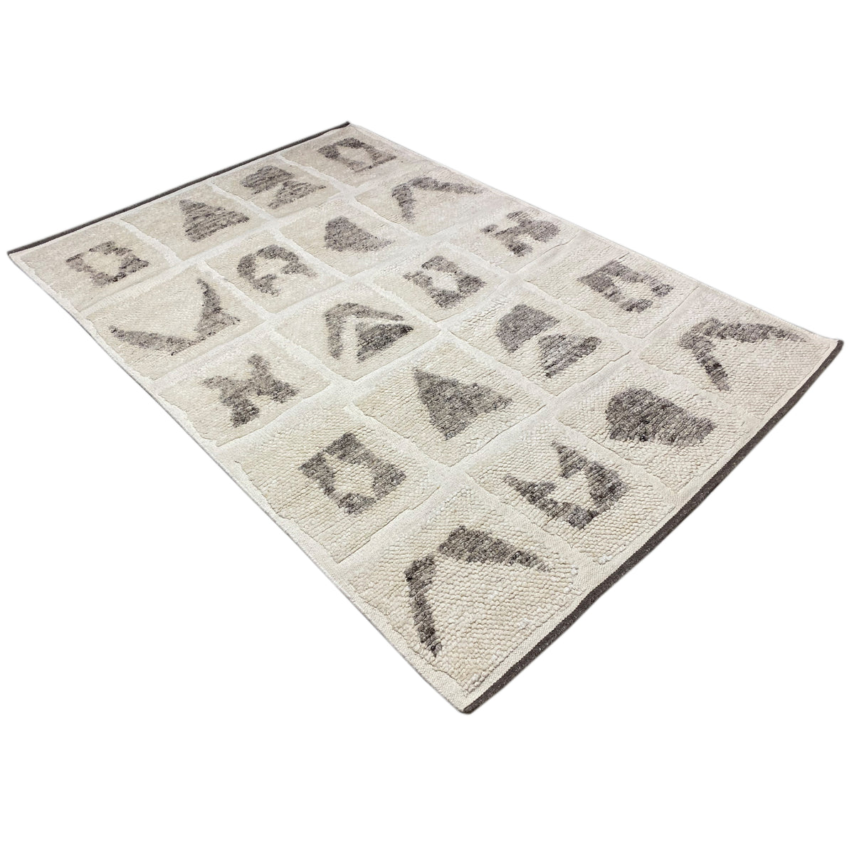 Berber rug with a beige background and gray geometric symbols in a grid
