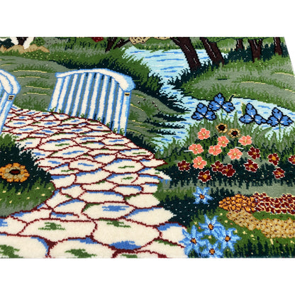 Tapestry detail: paved path, flower beds, and blue water