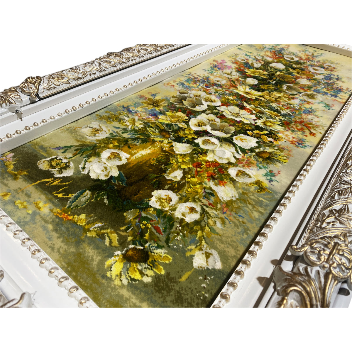Tapestry with a floral motif, beaded border, and ornate frame, detail view.