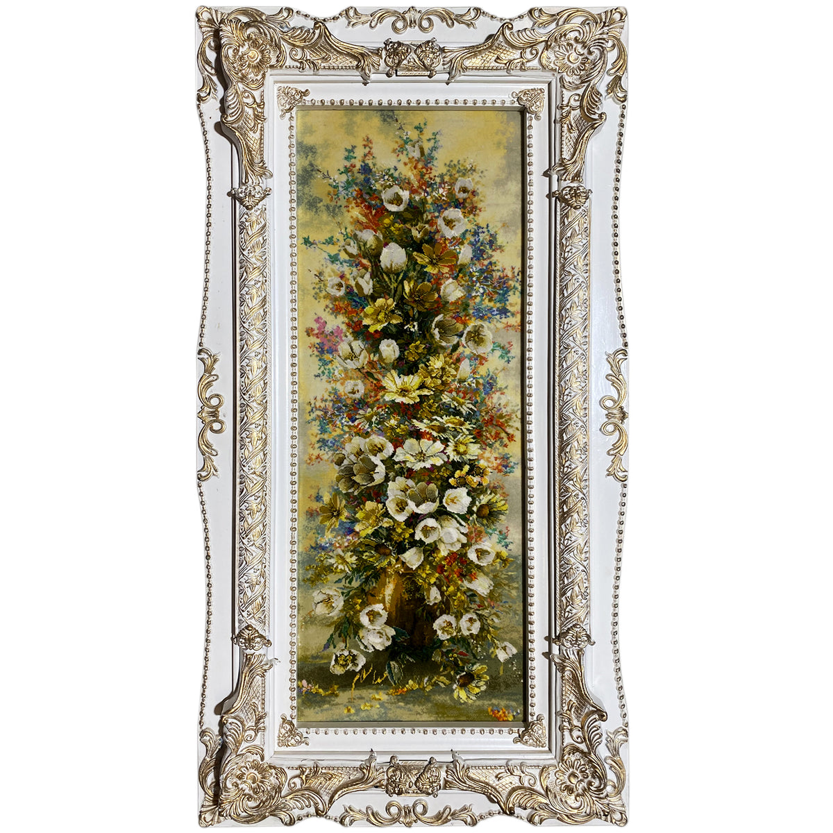 Tapestry with a floral design in an ornate gold-and-silver frame, 98x37 cm.