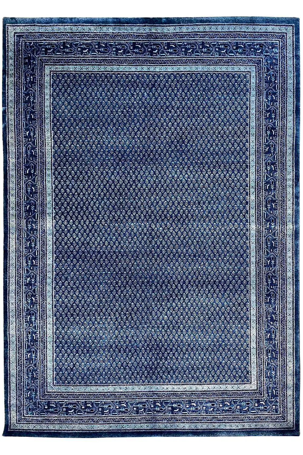 Square blue rug with a decorative border and fine texture