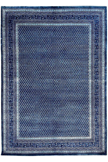 Square blue rug with a decorative border and fine texture