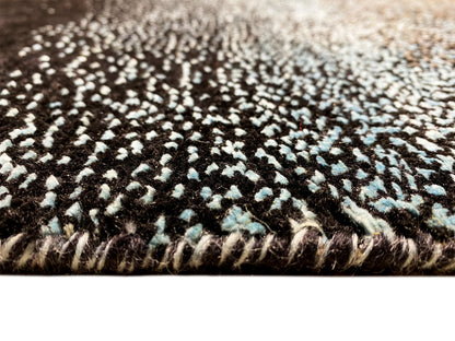 Designer rug, black-and-white pattern with turquoise accents and fringes