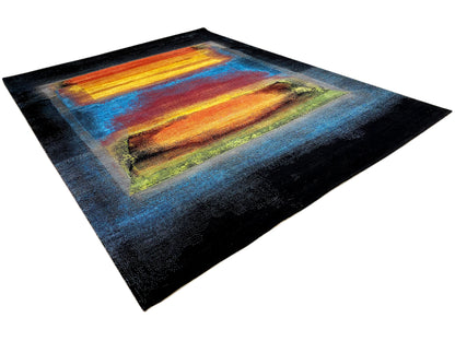 Rectangular rug with abstract color gradients in blue, orange, yellow, and green