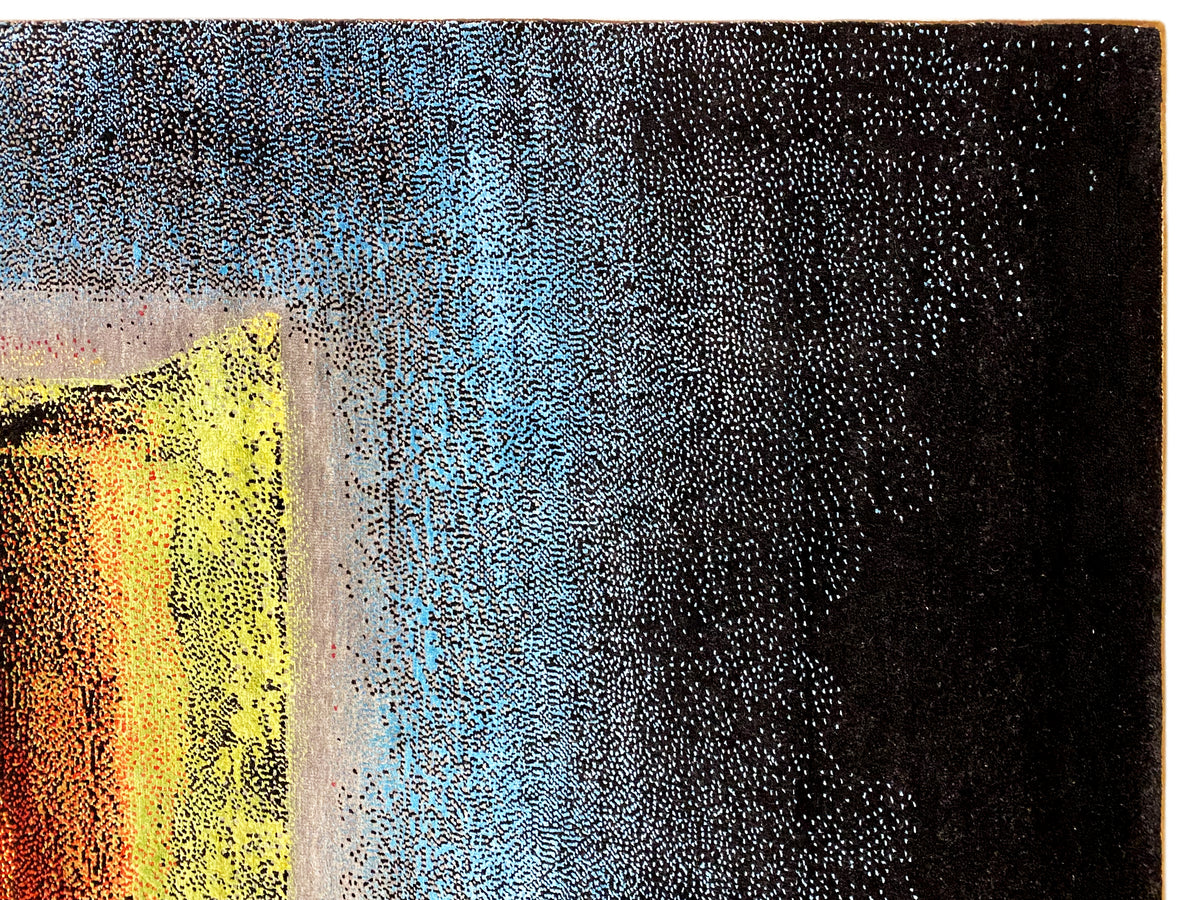 Carpet detail: dense pile with a blue pattern and a yellow-orange area on the left