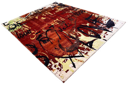 Diagonal rug, abstract pattern in reddish brown, dark blue, and beige with a greenish accent