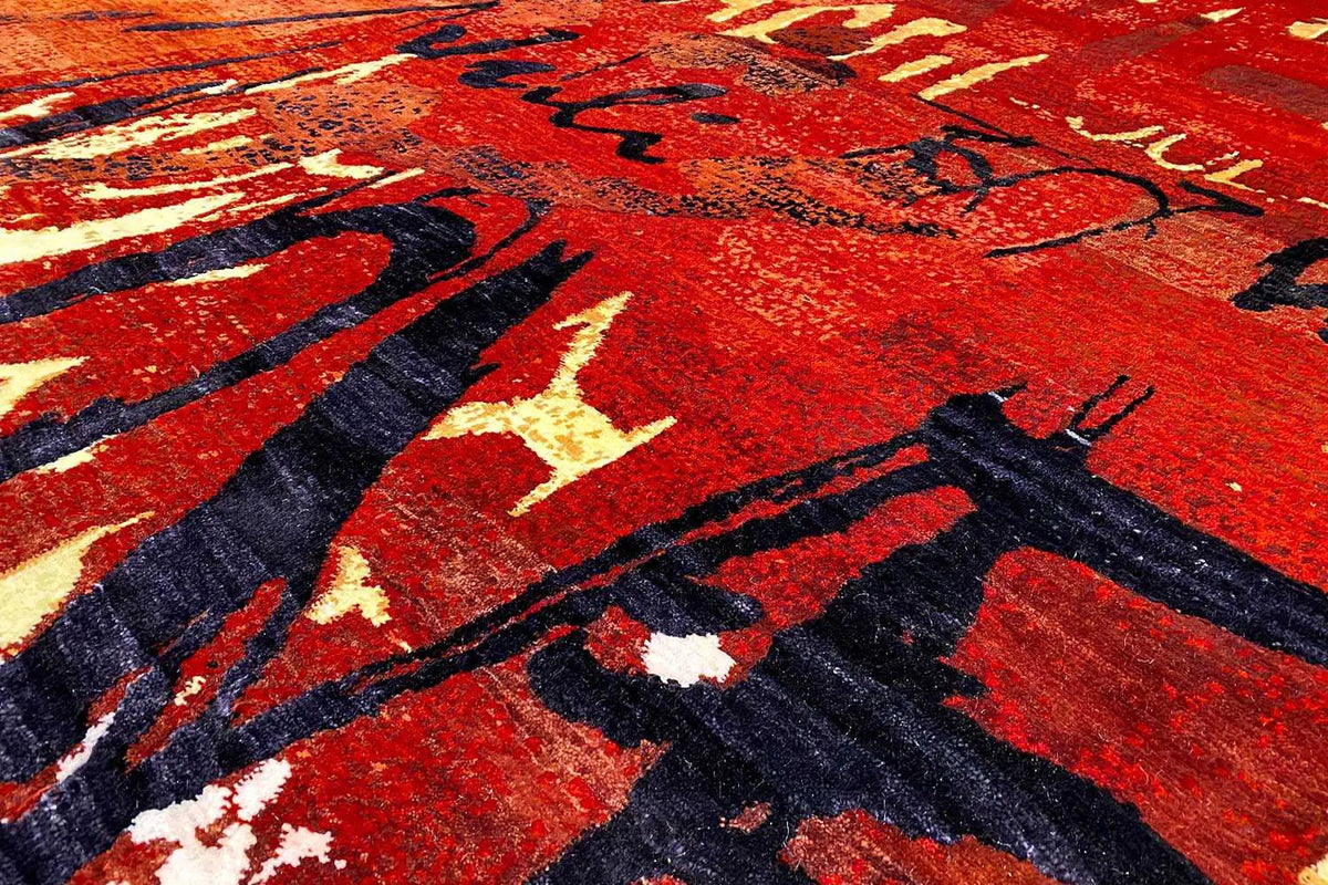 Rug with an abstract pattern, bold red with black lines and light accents