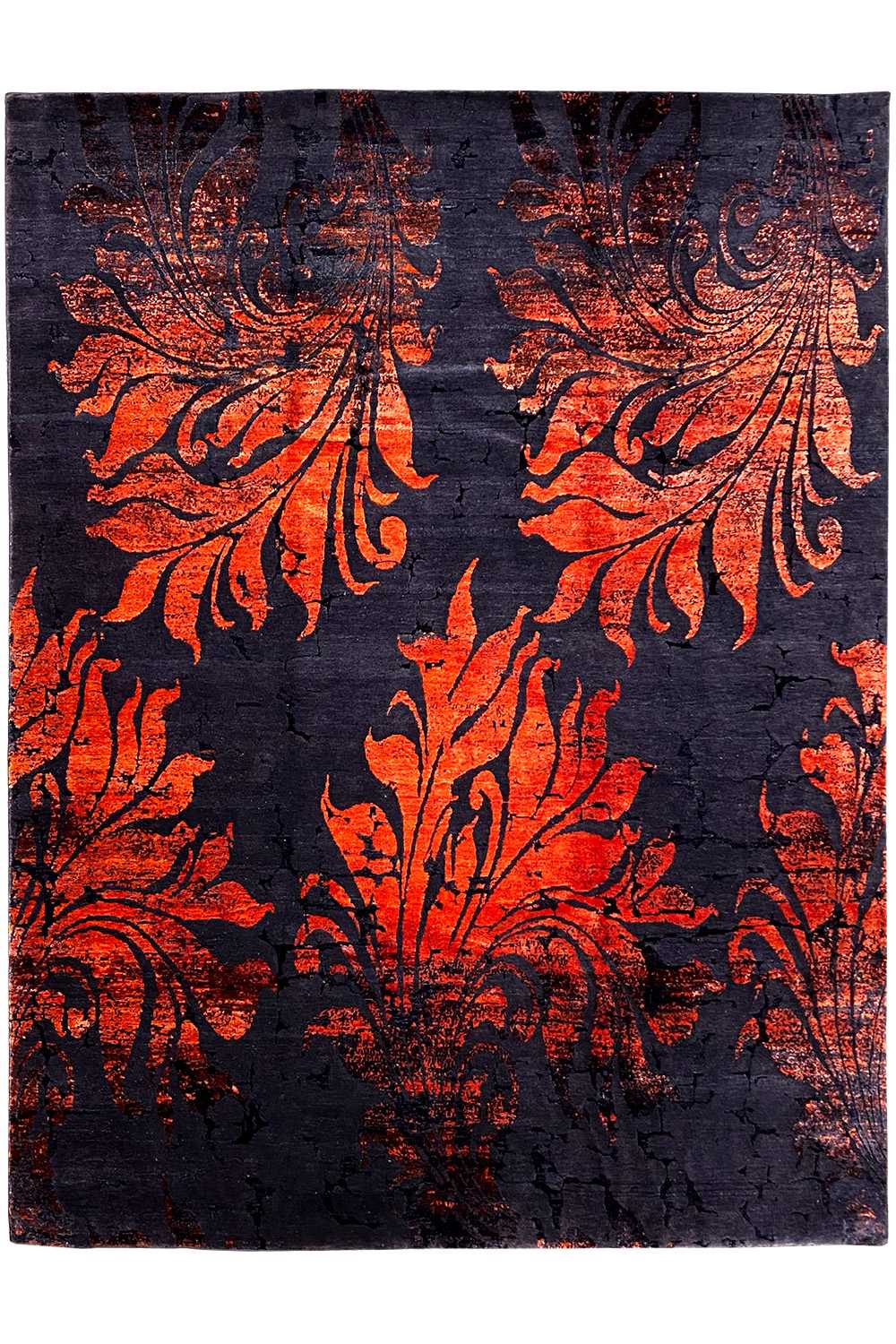 Rug with a dark background and a large-scale orange ornamental pattern, bordered edges.