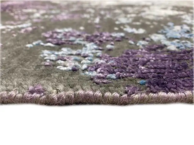 Rug 185×122 cm detail view: short pile with purple and blue color transitions.