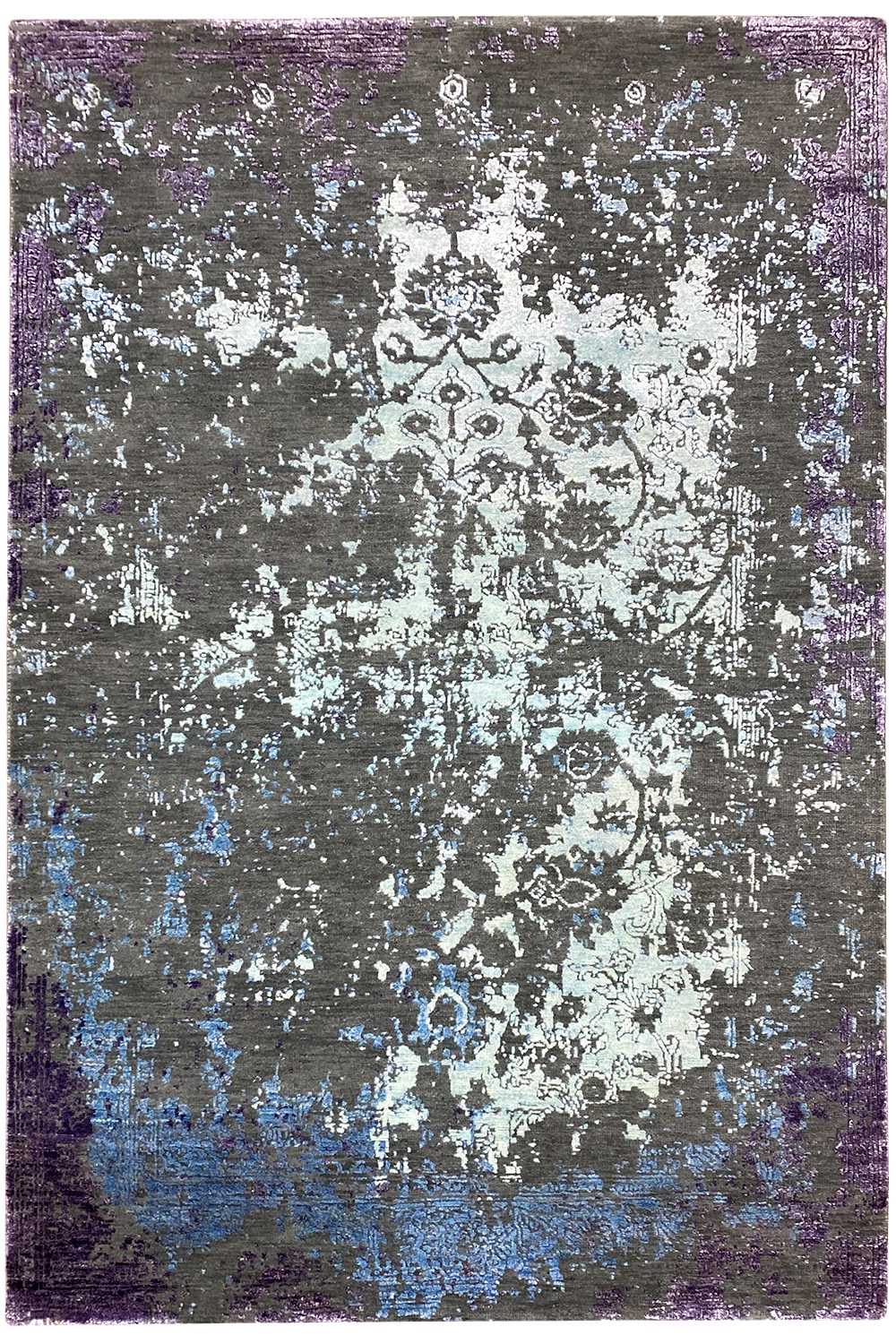 Rug 185×122 cm front view with an ornamental vintage pattern in purple and blue.