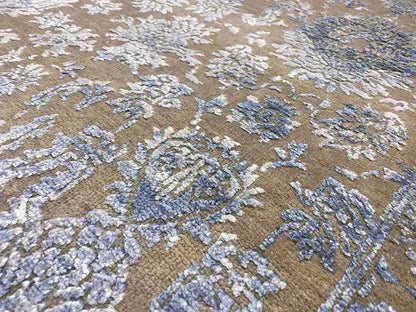 Designer rug, detailed view: ornate pattern in beige and blue-gray