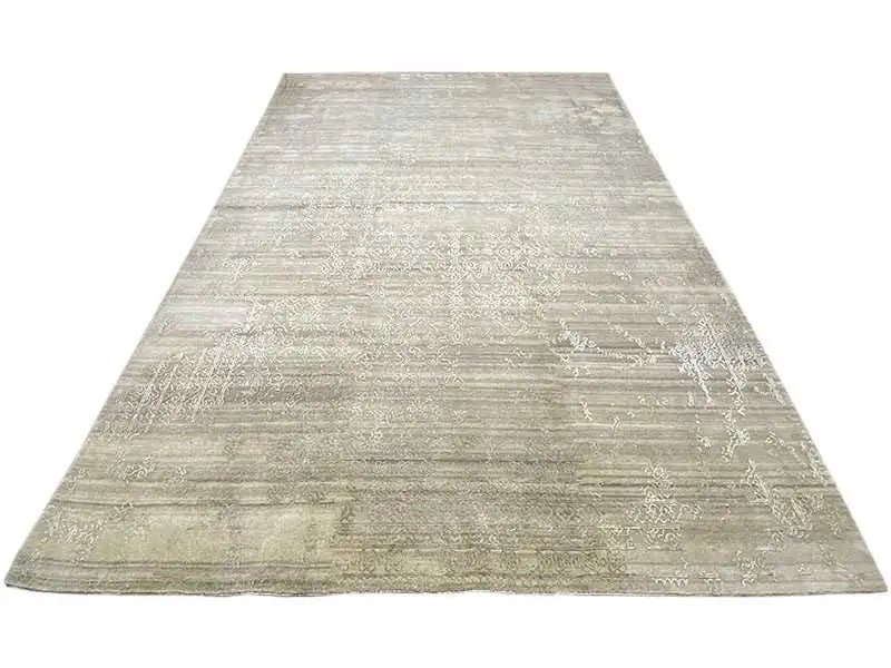 Large rug with a beige, even vintage texture without a prominent border