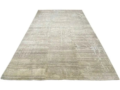 Large rug with a beige, even vintage texture without a prominent border