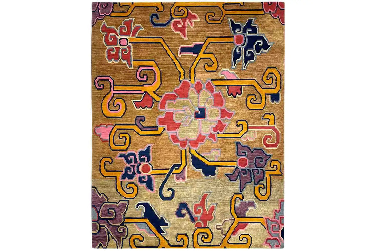 Square designer rug with an orange base and colorful cross patterns