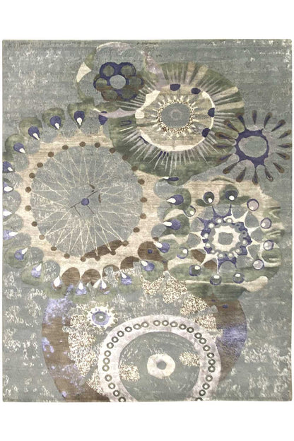 Rug with large circular ornaments and floral motifs in gray, blue, and violet