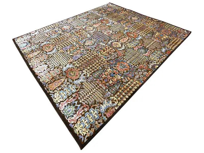 Rug with a large-scale multicolored ornament and vine pattern on a dark brown background.