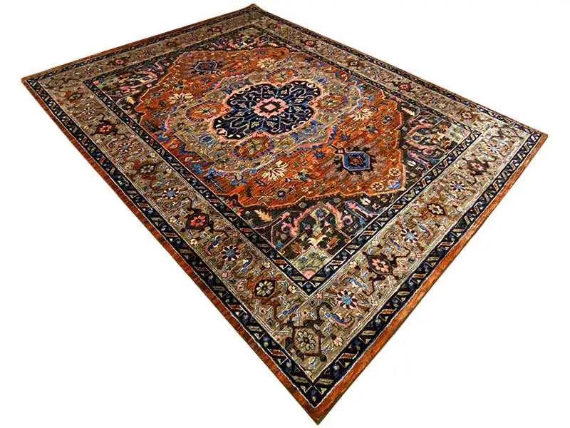 Rectangular rug with a floral medallion in earthy orange, blue, and beige tones