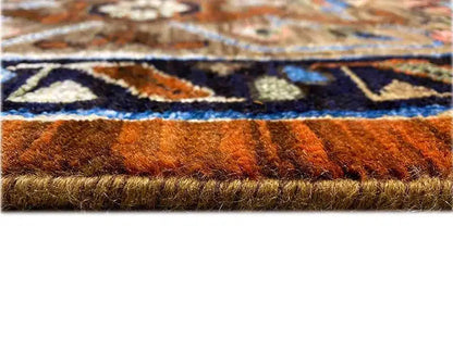 Carpet pile in detail: reddish-brown fibers with a colorful pattern underneath