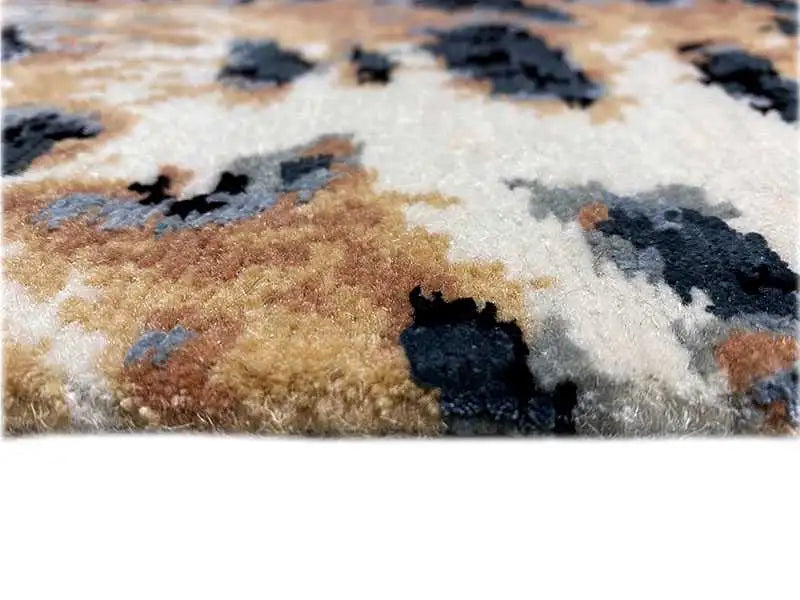 Designer rug with Bo-Hamsa pattern, beige pile, and dark brown blotch shapes