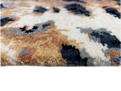 Designer rug with Bo-Hamsa pattern, beige pile, and dark brown blotch shapes