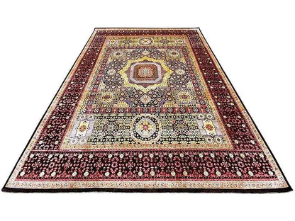 Rug with a rectangular surface and ornaments in burgundy, cream, black, and gold