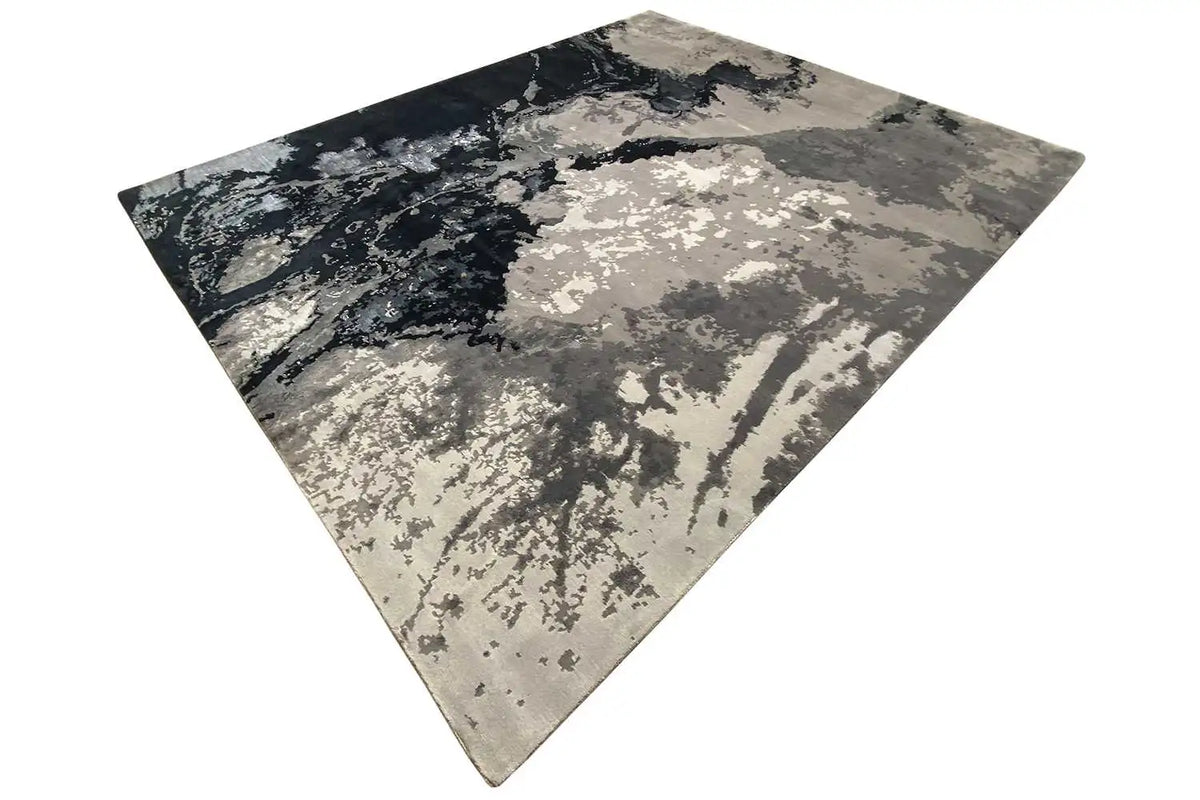 Square rug: light gray and dark blue with an abstract, cloud-like pattern