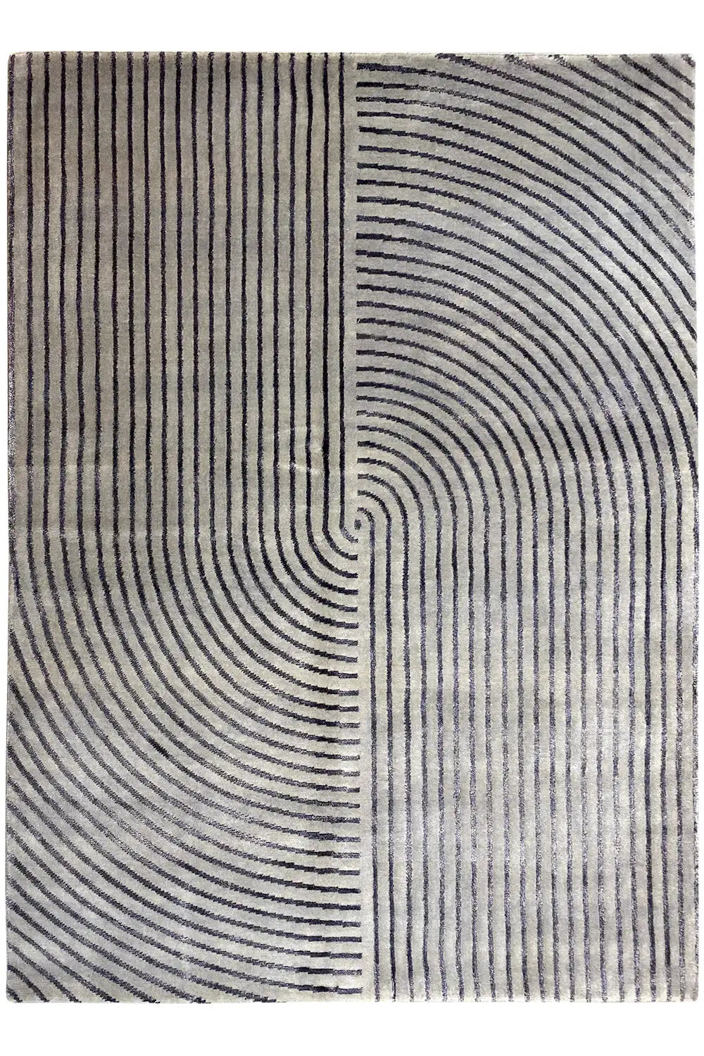 Rug with vertical lines on the left and concentric arcs on the right in dark blue