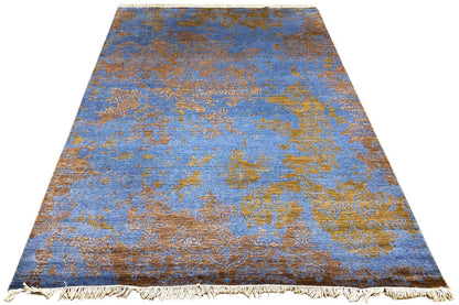 Carpet 365 x 275 cm, blue pile with golden ornaments, fringed edges