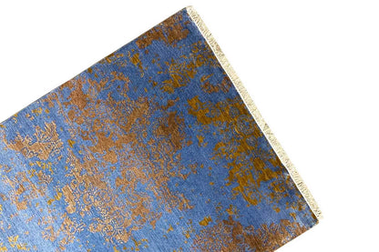 Rug 365 x 275 cm: fringed side edge, blue and gold ornamental pattern